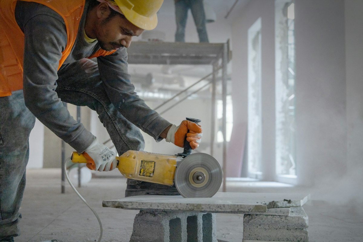 Grinding a concrete slab before coating